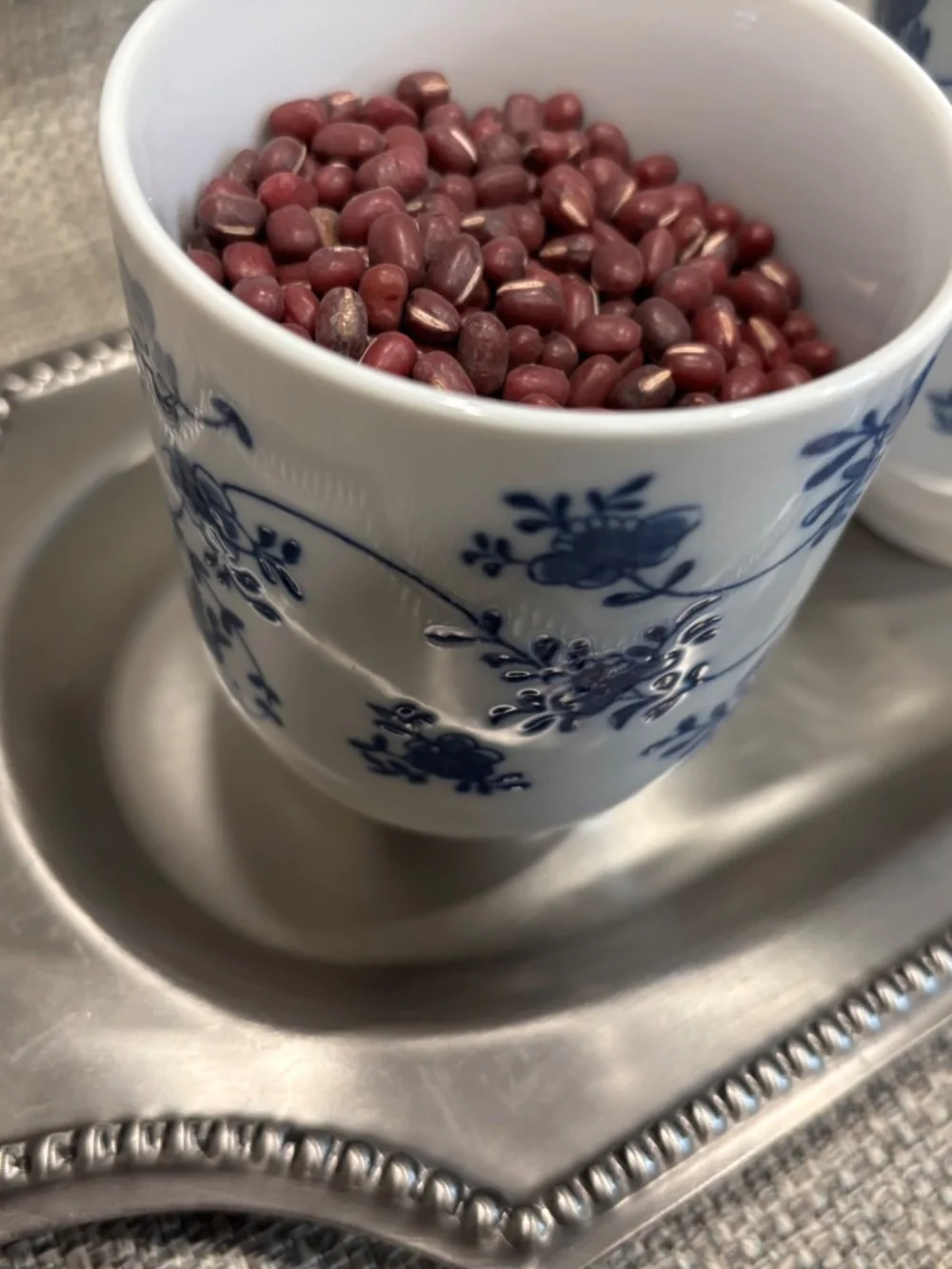 practical life pouring 1:1 w/floral tumblers ceramic by idlewild montessori